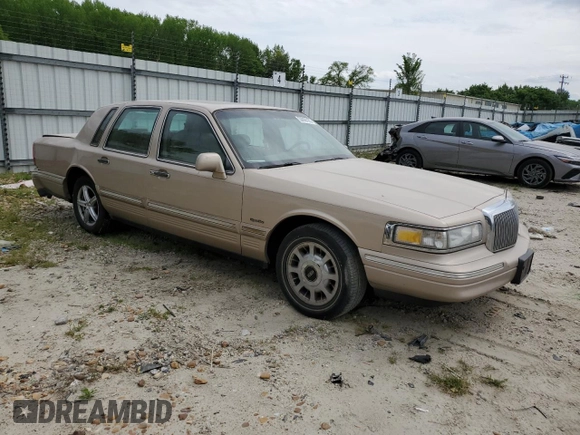 1997 Lincoln Town Car Signature z VIN 1LNLM82W8VY705599, wystawiony jako Copart lot #53096165 z przebiegiem 166 585 mil mil oraz Czysty tytuł • Clean title. Historia ofert i sprzedaży dostępna na DreamBid. Obrazek 4.