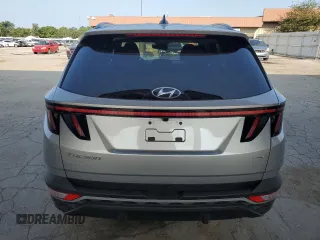 2023 Hyundai Tucson SEL z VIN KM8JBCAE6PU264297, wystawiony jako Copart lot #63981404 z przebiegiem 12 077 mil mil oraz Szkoda całkowita • Salvage title. Historia ofert i sprzedaży dostępna na DreamBid. Obrazek 6.
