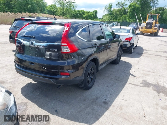 2015 Honda CR-V LX with VIN 2HKRM4H38FH601802, listed as a IAAI auction lot 42177101 with 71,775 mi miles and . Bid and sale history available at DreamBid. Image 4.