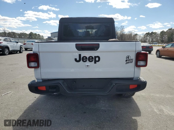 2023 Jeep Gladiator Sport S with VIN 1C6HJTAG4PL556387, listed as a Copart auction lot 47453305 with 35,611 mi miles and Salvage title. Bid and sale history available at DreamBid. Image 6.