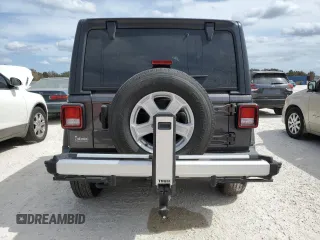 2021 Jeep Wrangler Sport with VIN 1C4GJXAN9MW552436, listed as a Copart auction lot 77204374 with Not Provided miles and Non Repairable. Bid and sale history available at DreamBid. Image 6.