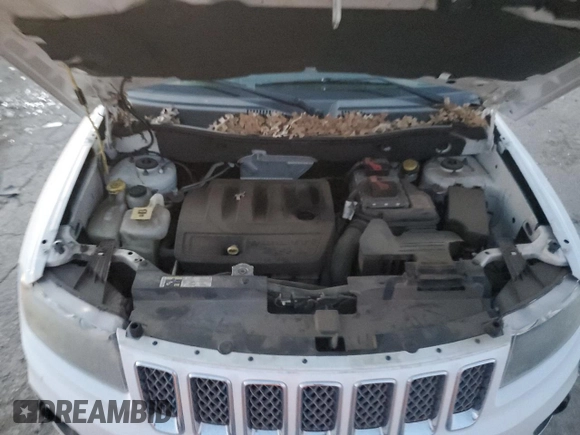 2014 Jeep Compass Latitude with VIN 1C4NJCEB0ED708098, listed as a Copart auction lot 81561334 with 105,687 mi miles and Salvage Title. Bid and sale history available at carsss.com. Image 11.