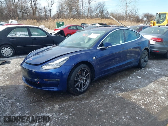 2018 Tesla Model 3 Long Range Battery with VIN 5YJ3E1EB8JF115138, listed as a IAAI auction lot 41343399 with 62,351 mi miles and . Bid and sale history available at DreamBid. Image 21.