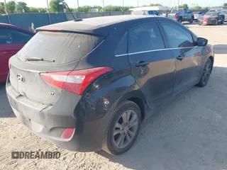 2014 Hyundai Elantra GT with VIN KMHD35LH3EU234636, listed as a IAAI auction lot 41998223 with 213,434 mi miles. Bid and sale history available at carsss.com. Image 4.