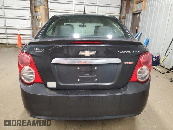 2014 Chevrolet Sonic LTZ with VIN 1G1JE5SB8E4213028, listed as a Copart auction lot 43561105 with 81,457 mi miles and Salvage Title. Bid and sale history available at carsss.com. Image 6.