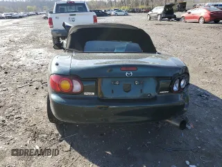 1999 Mazda MX-5 Miata z VIN JM1NB3536X0133733, wystawiony jako Copart lot #50906215 z przebiegiem Nie podano mil oraz Szkoda całkowita • Salvage title. Historia ofert i sprzedaży dostępna na DreamBid. Obrazek 6.