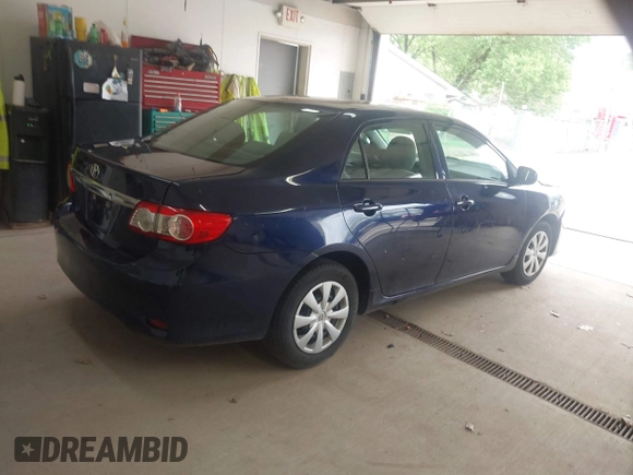 2013 Toyota Corolla L with VIN 5YFBU4EE8DP217364, listed as a IAAI auction lot 42144930 with 164,721 mi miles and . Bid and sale history available at DreamBid. Image 4.