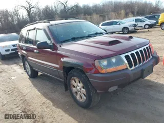 2001 Jeep Grand Cherokee Laredo with VIN 1J4GW48SX1C508609, listed as a IAAI auction lot 41780729 with 144,796 mi miles. Bid and sale history available at carsss.com. Image 1.