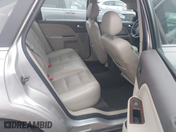 2008 Ford Taurus SEL with VIN 1FAHP24W78G105183, listed as a IAAI auction lot 41441086 with 215,758 mi miles. Bid and sale history available at carsss.com. Image 8.