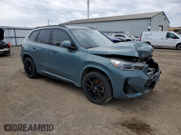 2023 BMW X1 xDrive28i with VIN WBX73EF02P5W11223, listed as a Copart auction lot 49205155 with 17,083 mi miles and Salvage Title. Bid and sale history available at DreamBid. Image 4.