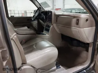 2004 Chevrolet Tahoe LS with VIN 1GNEK13Z34J166486, listed as a IAAI auction lot 41821497 with 164,388 mi miles. Bid and sale history available at carsss.com. Image 5.