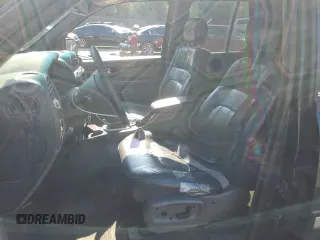 2003 GMC Envoy SLT with VIN 1GKDT13S032396374, listed as a Copart auction lot 74675134 with 115,280 mi miles and Salvage Title. Bid and sale history available at carsss.com. Image 7.