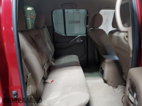 2007 Nissan Frontier Nismo z VIN 1N6AD07W07C431849, wystawiony jako Copart lot #52563235 z przebiegiem 193 592 mil mil oraz Nie do naprawy • Non repairable. Historia ofert i sprzedaży dostępna na DreamBid. Obrazek 10.