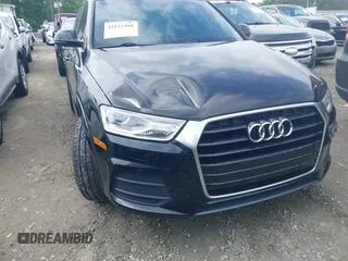 2016 Audi Q3 Premium Plus with VIN WA1BFCFSXGR022587, listed as a IAAI auction lot 42133288 with 141,609 mi miles. Bid and sale history available at carsss.com. Image 6.
