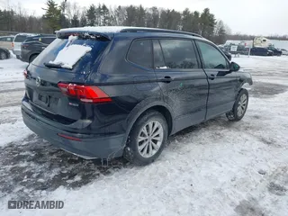2019 Volkswagen Tiguan S with VIN 3VV0B7AX9KM047642, listed as a IAAI auction lot 41523269 with 61,221 mi miles. Bid and sale history available at carsss.com. Image 4.