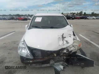 2009 Nissan Versa 1.8 S with VIN 3N1BC13E99L406584, listed as a IAAI auction lot 41687026 with 107,454 mi miles. Bid and sale history available at carsss.com. Image 6.