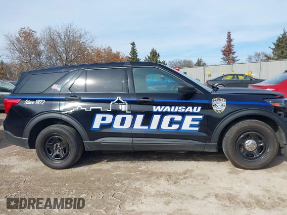 2020 Ford Police Interceptor Utility z VIN 1FM5K8AB2LGC51317, wystawiony jako IAAI lot #41755681 z przebiegiem 102 945 mil mil oraz . Historia ofert i sprzedaży dostępna na DreamBid. Obrazek 13.