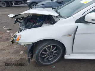 2017 Mitsubishi Lancer ES with VIN JA32V2FW8HU006570, listed as a IAAI auction lot 41366177 with 138,247 mi miles. Bid and sale history available at carsss.com. Image 6.