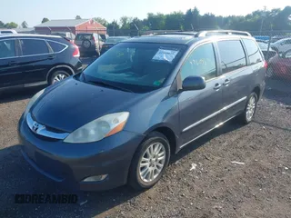 2008 Toyota Sienna XLE with VIN 5TDBK22C58S017861, listed as a IAAI auction lot 42604679 with 144,934 mi miles and . Bid and sale history available at DreamBid. Image 2.