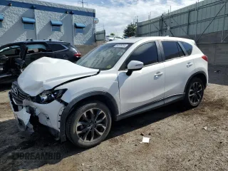 2016 Mazda CX-5 Grand Touring with VIN JM3KE2DY0G0888854, listed as a Copart auction lot 68379754 with 73,096 mi miles and Salvage Title. Bid and sale history available at carsss.com. Image 1.