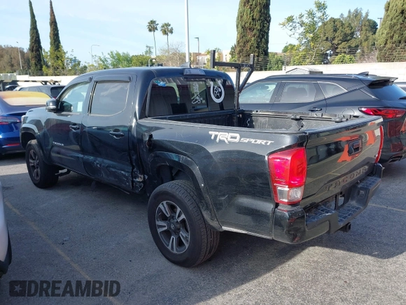 2017 Toyota Tacoma SR5 with VIN 5TFAZ5CN0HX053573, listed as a IAAI auction lot 41797867 with 102,628 mi miles and . Bid and sale history available at DreamBid. Image 3.