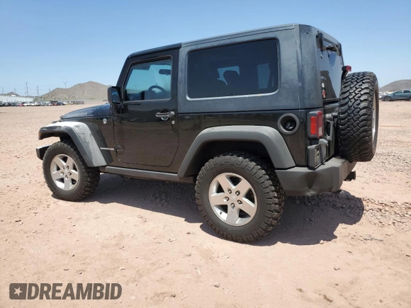 2009 Jeep Wrangler Rubicon with VIN 1J4GA64179L703716, listed as a Copart auction lot 61084215 with 190,262 mi miles and Salvage title. Bid and sale history available at DreamBid. Image 2.