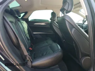 2014 Lincoln MKZ z VIN 3LN6L2JK6ER833317, wystawiony jako Copart lot #50555105 z przebiegiem 157 510 mil mil oraz Szkoda całkowita • Salvage title. Historia ofert i sprzedaży dostępna na DreamBid. Obrazek 10.