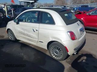 2012 FIAT 500 Lounge z VIN 3C3CFFER7CT119147, wystawiony jako IAAI lot #41431509 z przebiegiem 140 084 mil mil oraz . Historia ofert i sprzedaży dostępna na DreamBid. Obrazek 3.