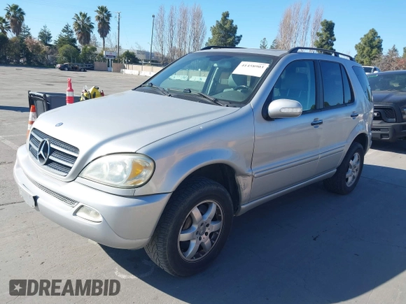 2002 Mercedes-Benz M 320/430/500 with VIN 4JGAB75EX2A358923, listed as a IAAI auction lot 41458903 with 134,623 mi miles and . Bid and sale history available at DreamBid. Image 2.