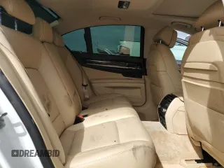 2013 BMW 7 Series 740i with VIN WBAYA6C58DC995137, listed as a Copart auction lot 75774104 with 61,847 mi miles and Salvage Title. Bid and sale history available at carsss.com. Image 10.