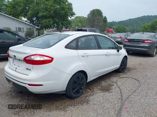 2014 Ford Fiesta S z VIN 3FADP4AJ6EM168697, wystawiony jako IAAI lot #42438281 z przebiegiem 78 298 mil mil oraz . Historia ofert i sprzedaży dostępna na DreamBid. Obrazek 4.