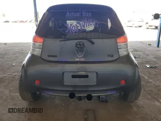 2012 Scion iQ z VIN JTNJJXB09CJ012794, wystawiony jako Copart lot #52983435 z przebiegiem 135 927 mil mil oraz Szkoda całkowita • Salvage title. Historia ofert i sprzedaży dostępna na DreamBid. Obrazek 6.