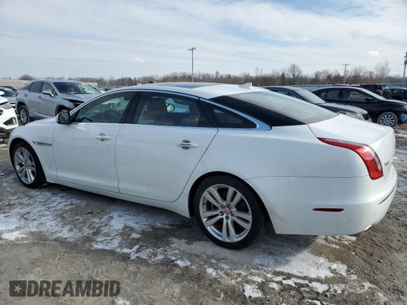 2015 Jaguar XJ Portfolio z VIN SAJWJ2GD5F8V77355, wystawiony jako Copart lot #47214835 z przebiegiem 73 202 mil mil oraz Szkoda całkowita • Salvage title. Historia ofert i sprzedaży dostępna na DreamBid. Obrazek 2.