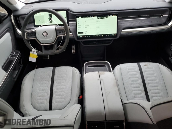 2024 Rivian R1T Adventure with VIN 7FCTGBAA8RN034399, listed as a Copart auction lot 86857044 with 8,176 mi miles and Salvage Title. Bid and sale history available at carsss.com. Image 8.