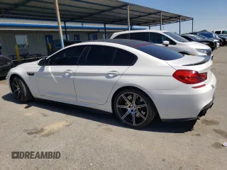 2015 BMW M6 z VIN WBS6C9C50FD467538, wystawiony jako Copart lot #52152245 z przebiegiem 65 483 mil mil oraz Czysty tytuł • Clean title. Historia ofert i sprzedaży dostępna na DreamBid. Obrazek 2.