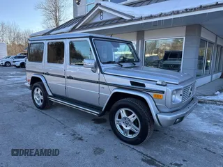 2003 Mercedes-Benz G-Class with VIN WDCYR49E23X141382, listed as a IAAI auction lot 41654677 with 329,762 mi miles. Bid and sale history available at carsss.com. Image 1.