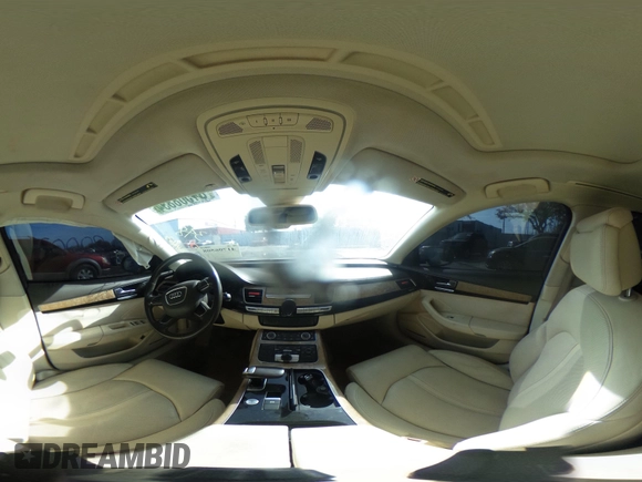 2012 Audi A8 z VIN WAURVAFD3CN024063, wystawiony jako IAAI lot #41706508 z przebiegiem Nie podano mil oraz . Historia ofert i sprzedaży dostępna na DreamBid. Obrazek 18.