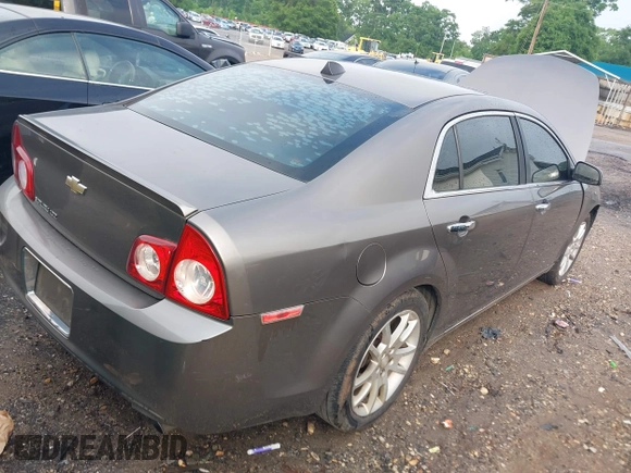 2012 Chevrolet Malibu LTZ with VIN 1G1ZG5E7XCF200982, listed as a IAAI auction lot 42052609 with 196,449 mi miles and . Bid and sale history available at DreamBid. Image 4.