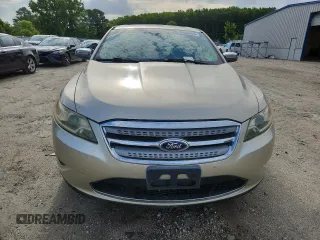 2010 Ford Taurus Limited with VIN 1FAHP2FW7AG138753, listed as a Copart auction lot 64880025 with 242,728 mi miles and Clean title. Bid and sale history available at DreamBid. Image 5.