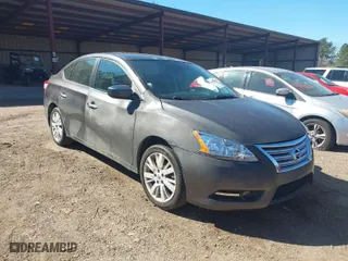 2015 Nissan Sentra S with VIN 3N1AB7AP5FY310374, listed as a IAAI auction lot 41653454 with 142,039 mi miles. Bid and sale history available at carsss.com. Image 1.