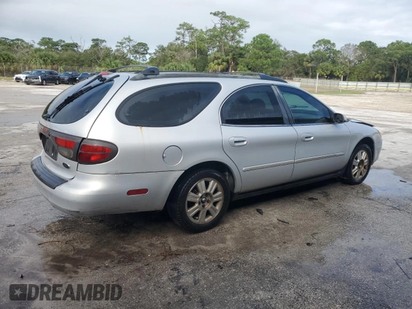 2003 Ford Taurus z VIN 1FAHP59U73A217826, wystawiony jako Copart lot #80059964 z przebiegiem 315 560 mil mil oraz Szkody całkowita. Historia ofert i sprzedaży dostępna na DreamBid. Obrazek 3.