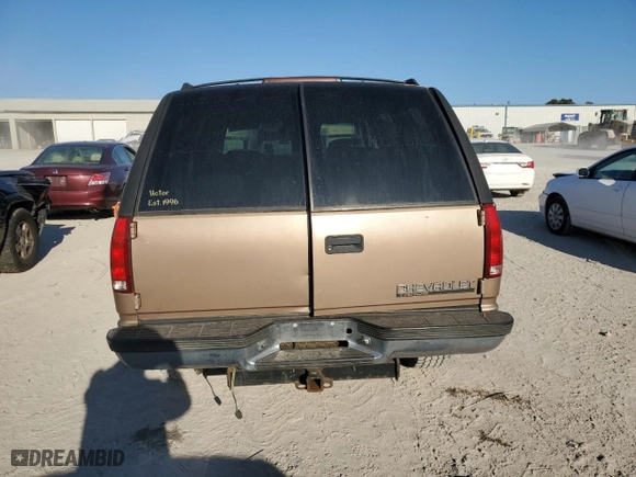 1996 Chevrolet Tahoe with VIN 1GNEK13R1TJ385350, listed as a Copart auction lot 77593884 with 169,178 mi miles and Salvage Title. Bid and sale history available at carsss.com. Image 6.