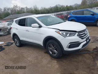 2018 Hyundai Santa Fe 2.4L z VIN 5NMZTDLB3JH089292, wystawiony jako IAAI lot #42129790 z przebiegiem 107 728 mil mil oraz . Historia ofert i sprzedaży dostępna na DreamBid. Obrazek 1.