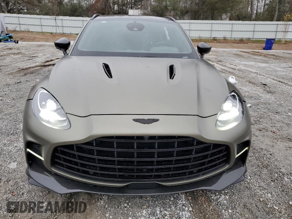 2023 Aston Martin DBX 707 z VIN SD7VUJBW5PTV06160, wystawiony jako Copart lot #76512973 z przebiegiem Nie podano mil oraz . Historia ofert i sprzedaży dostępna na DreamBid. Obrazek 5.
