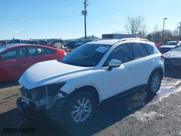 2016 Mazda CX-5 Touring with VIN JM3KE2CY4G0728171, listed as a IAAI auction lot 41853111 with NaN miles. Bid and sale history available at carsss.com. Image 2.