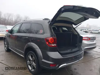 2017 Dodge Journey Crossroad Plus z VIN 3C4PDCGB5HT501363, wystawiony jako IAAI lot #41178334 z przebiegiem 119 076 mil mil oraz . Historia ofert i sprzedaży dostępna na DreamBid. Obrazek 3.