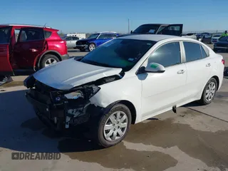 2023 Kia Rio S z VIN 3KPA24AD9PE567364, wystawiony jako IAAI lot #41145615 z przebiegiem 82 143 mil mil oraz . Historia ofert i sprzedaży dostępna na DreamBid. Obrazek 17.