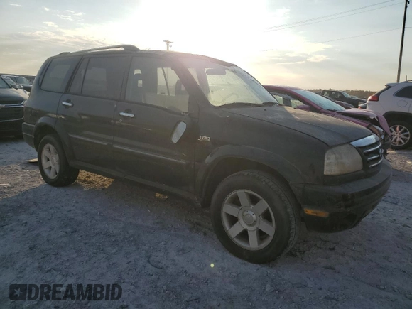 2001 Suzuki XL7 Standard z VIN JS3TX92V514102993, wystawiony jako Copart lot #76669614 z przebiegiem 65 789 mil mil oraz Szkoda całkowita • Salvage title. Historia ofert i sprzedaży dostępna na DreamBid. Obrazek 4.