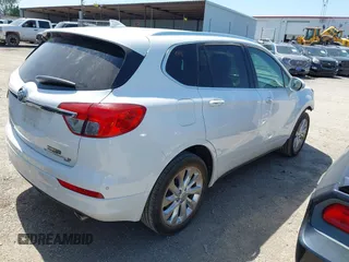 2016 Buick Envision Premium I with VIN LRBFXESX6GD235100, listed as a IAAI auction lot 41985343 with 51,376 mi miles and . Bid and sale history available at DreamBid. Image 4.