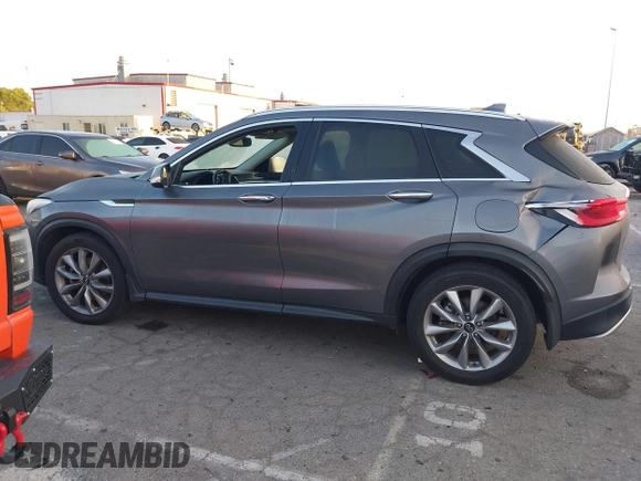 2021 Infiniti QX50 Luxe with VIN 3PCAJ5BA9MF124179, listed as a IAAI auction lot 42296244 with 79,935 mi miles and . Bid and sale history available at DreamBid. Image 14.